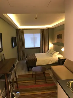 Cama o camas de una habitación en Recoletos Estudio en la mejor zona de Madrid