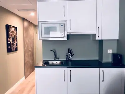Una cocina o zona de cocina en Recoletos Estudio en la mejor zona de Madrid
