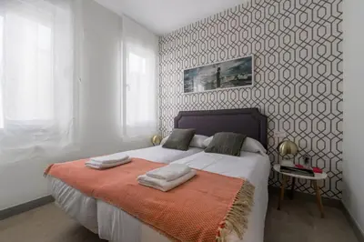 Cama o camas de una habitación en Refurbished WStylish - 3BD 2BTH - Salamanca