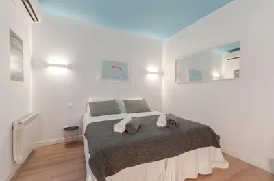 Cama o camas de una habitación en ºPS New Atocha Studio º