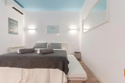 Cama o camas de una habitación en ºPS New Atocha Studio º
