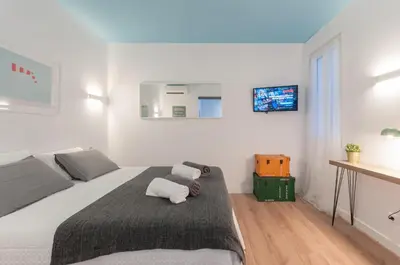 Cama o camas de una habitación en ºPS New Atocha Studio º