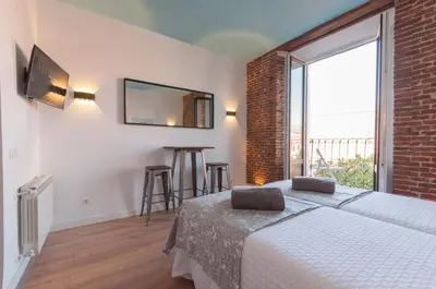 Cama o camas de una habitación en ººPS New Atocha Studio ºº