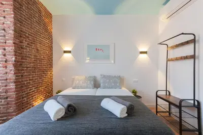Cama o camas de una habitación en ººPS New Atocha Studio ºº