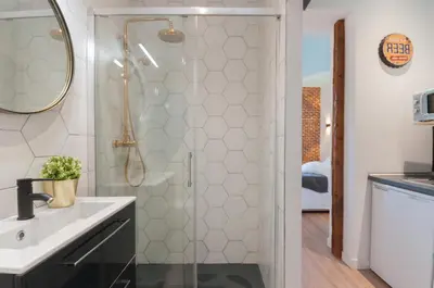 Un baño de ººPS New Atocha Studio ºº