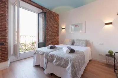 Cama o camas de una habitación en ººPS New Atocha Studio ºº