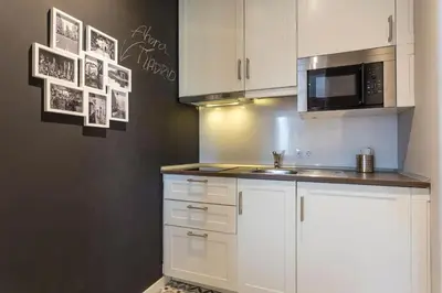 Una cocina o zona de cocina en ºººMZ Atocha Station Studio ººº