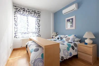 Cama o camas de una habitación en Centro Madrid Apartamentos Stopinflat
