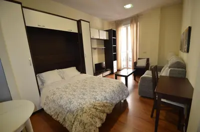 Cama o camas de una habitación en Centro Madrid Apartamentos Stopinflat