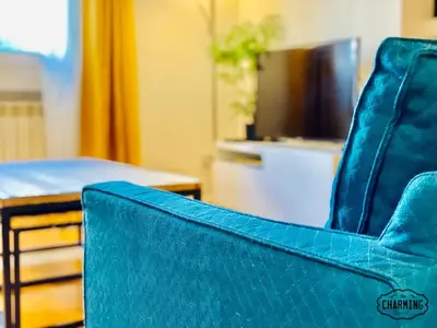 Una televisión o centro de entretenimiento en Retiro Exclusive - Apartamento de 2 dormitorios
