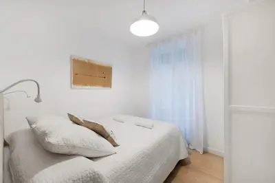 Cama o camas de una habitación en Stylish Bright 2BD apt. Atocha - Luca de Tena