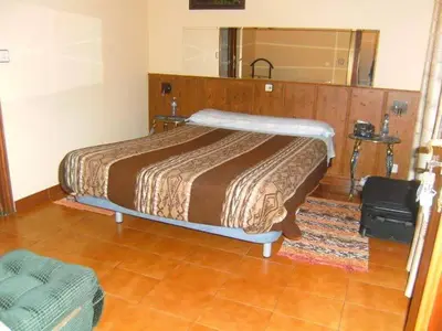 Cama o camas de una habitación en Hostal Suárez