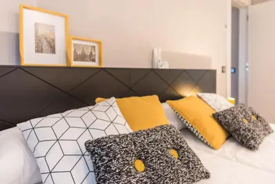 Cama o camas de una habitación en Gran View Apartments