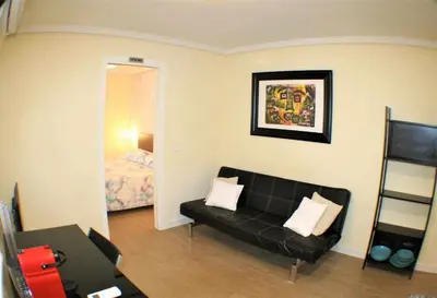 Zona de estar de Apartamento cercano a Madrid Rio céntrico. Nuevo