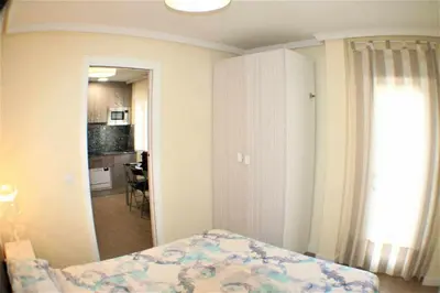 Cama o camas de una habitación en Apartamento cercano a Madrid Rio céntrico. Nuevo