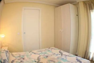 Cama o camas de una habitación en Apartamento cercano a Madrid Rio céntrico. Nuevo