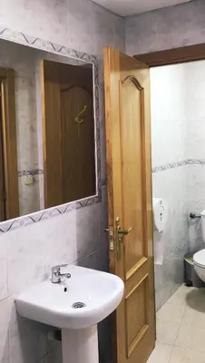 Un baño de Motel lavapies