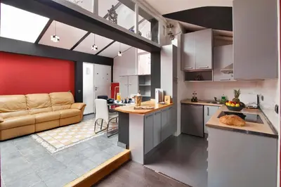 Una cocina o zona de cocina en Apartamentos El Tiempo