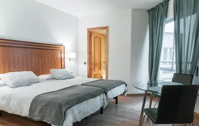 Cama o camas de una habitación en Estudio para dos en pleno centro de Madrid