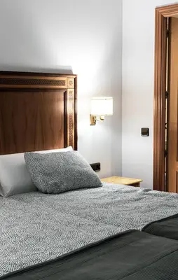 Cama o camas de una habitación en Estudio para dos en pleno centro de Madrid