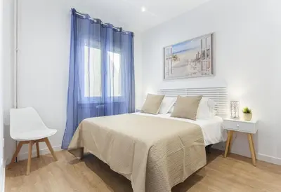 Cama o camas de una habitación en Latina en Madrid