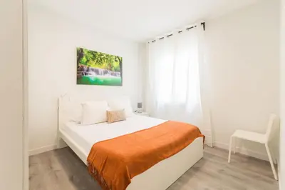 Cama o camas de una habitación en Latina en Madrid