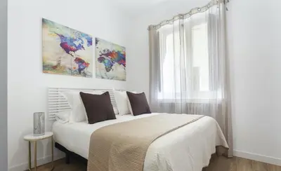 Cama o camas de una habitación en Artes Exclusive en Madrid