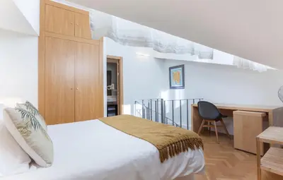 Cama o camas de una habitación en Apartamento Barquillo Duplex en Madrid