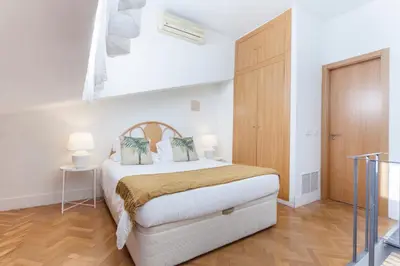 Cama o camas de una habitación en Apartamento Barquillo Duplex en Madrid