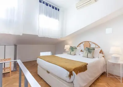 Cama o camas de una habitación en Apartamento Barquillo Duplex en Madrid