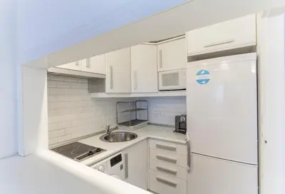 Una cocina o zona de cocina en Apartamento Barquillo Duplex en Madrid