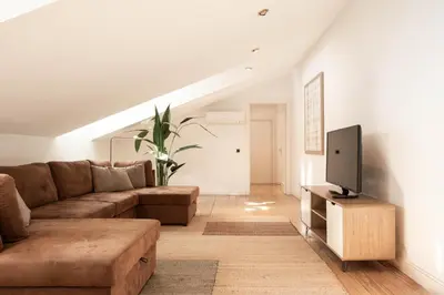 Una televisión o centro de entretenimiento en Apartamento Gran via Terrace en Madrid
