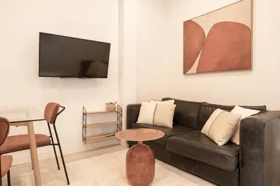 Una televisión o centro de entretenimiento en Apartamento Gran Via en Madrid