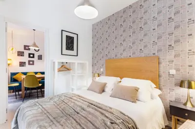 Cama o camas de una habitación en Lindo en Madrid