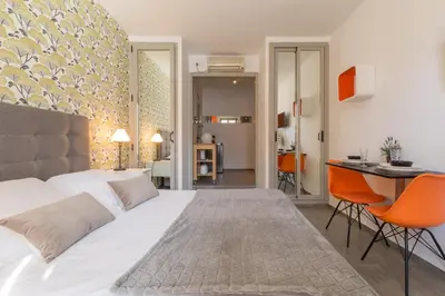 Cama o camas de una habitación en Santa Ana Boutique en Madrid