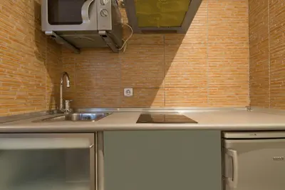 Una cocina o zona de cocina en Santa Ana Boutique en Madrid