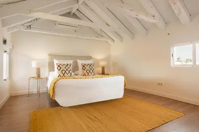 Cama o camas de una habitación en Apartamento Plaza Mayor Attic en Madrid