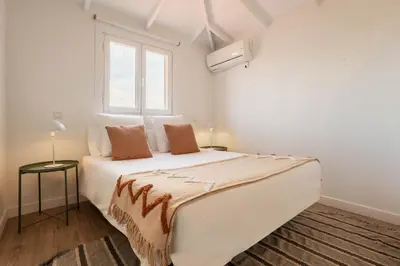 Cama o camas de una habitación en Apartamento Plaza Mayor Attic en Madrid