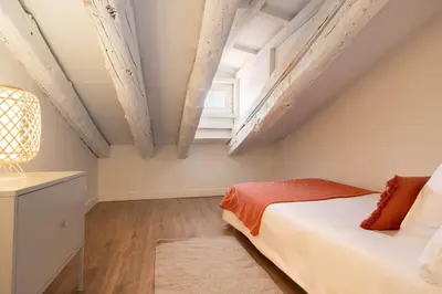 Cama o camas de una habitación en Apartamento Plaza Mayor Attic en Madrid