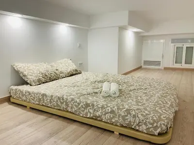 Cama o camas de una habitación en Piso céntrico y funcional