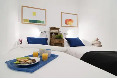 Cama o camas de una habitación en Apartamento Plaza Mayor III en Madrid