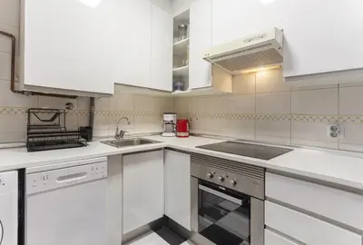 Una cocina o zona de cocina en Apartamento Tribeca Duplex en Madrid