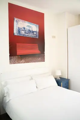 Cama o camas de una habitación en Guest House Éxito en Madrid
