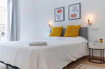 Cama o camas de una habitación en Comfortable 2BR2BA in Chueca