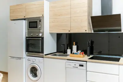 Una cocina o zona de cocina en Comfortable 2BR2BA in Chueca