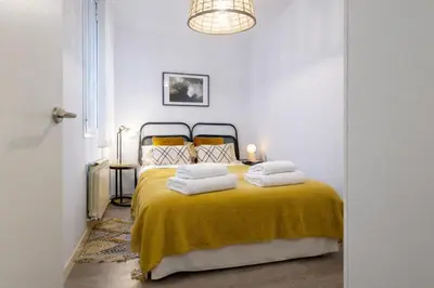 Cama o camas de una habitación en Atocha VI - Elegancia Urbana en una Ubicación Privilegiada