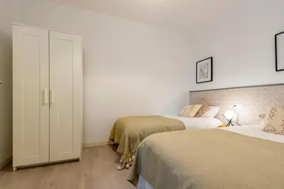 Cama o camas de una habitación en Atocha VI - Elegancia Urbana en una Ubicación Privilegiada
