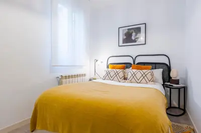Cama o camas de una habitación en Atocha VI - Elegancia Urbana en una Ubicación Privilegiada