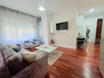 Una televisión o centro de entretenimiento en Gran Vía - Excellent Apartamento Temporal