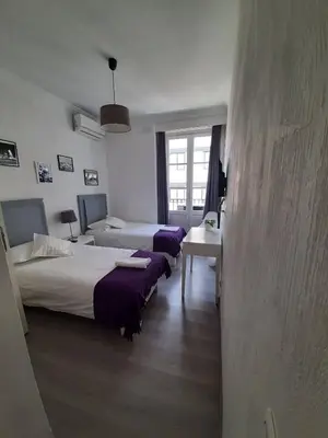 Cama o camas de una habitación en CH Lumiere